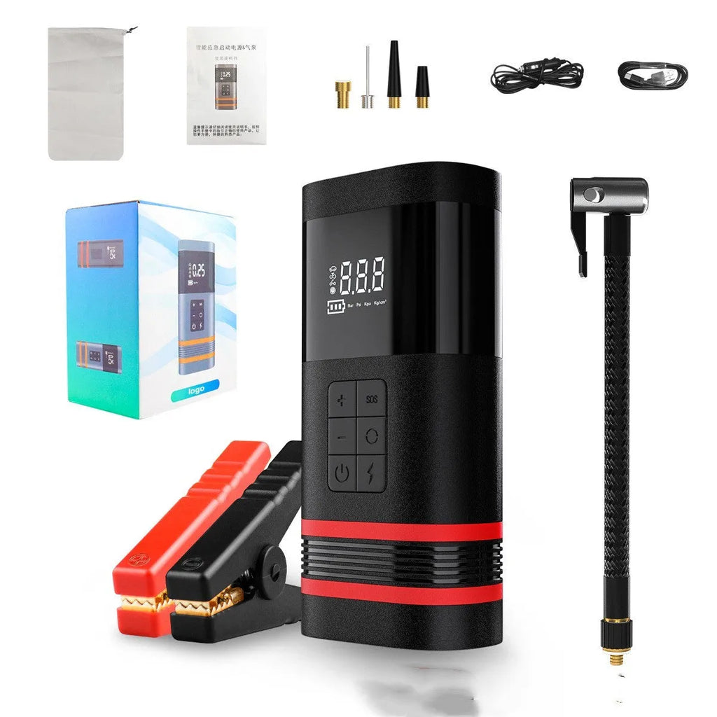 Black portable car jump starter power bank with LED display and attached cables on a grey background