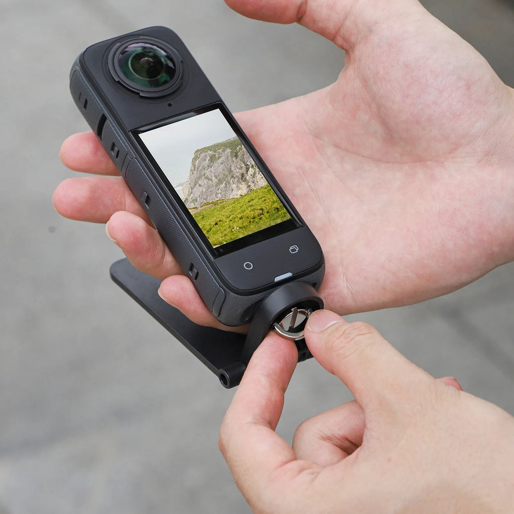 Black magnetic bracket base accessory for Insta360 X4 camera with adjustable angle handle