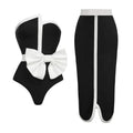 Black and white colour-blocking women's swimsuit with bow detail and irregular tube top