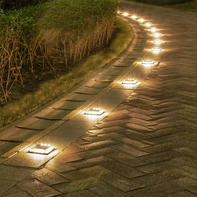Solar floor tile lamp for outdoor staircase layout with aluminium body and glass shade