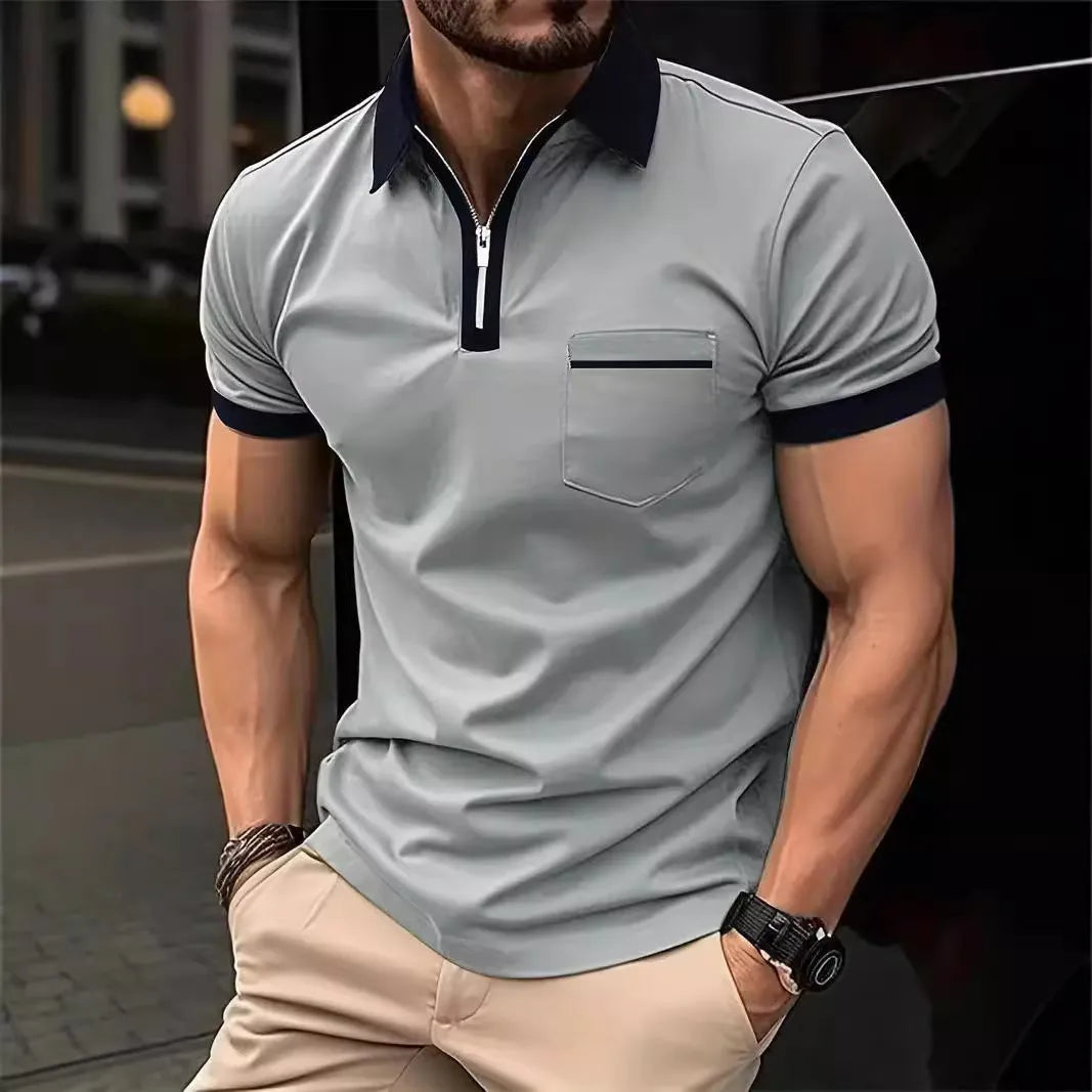 Men's loose fit short sleeve t-shirt with a chest pocket and zip trim on the front.