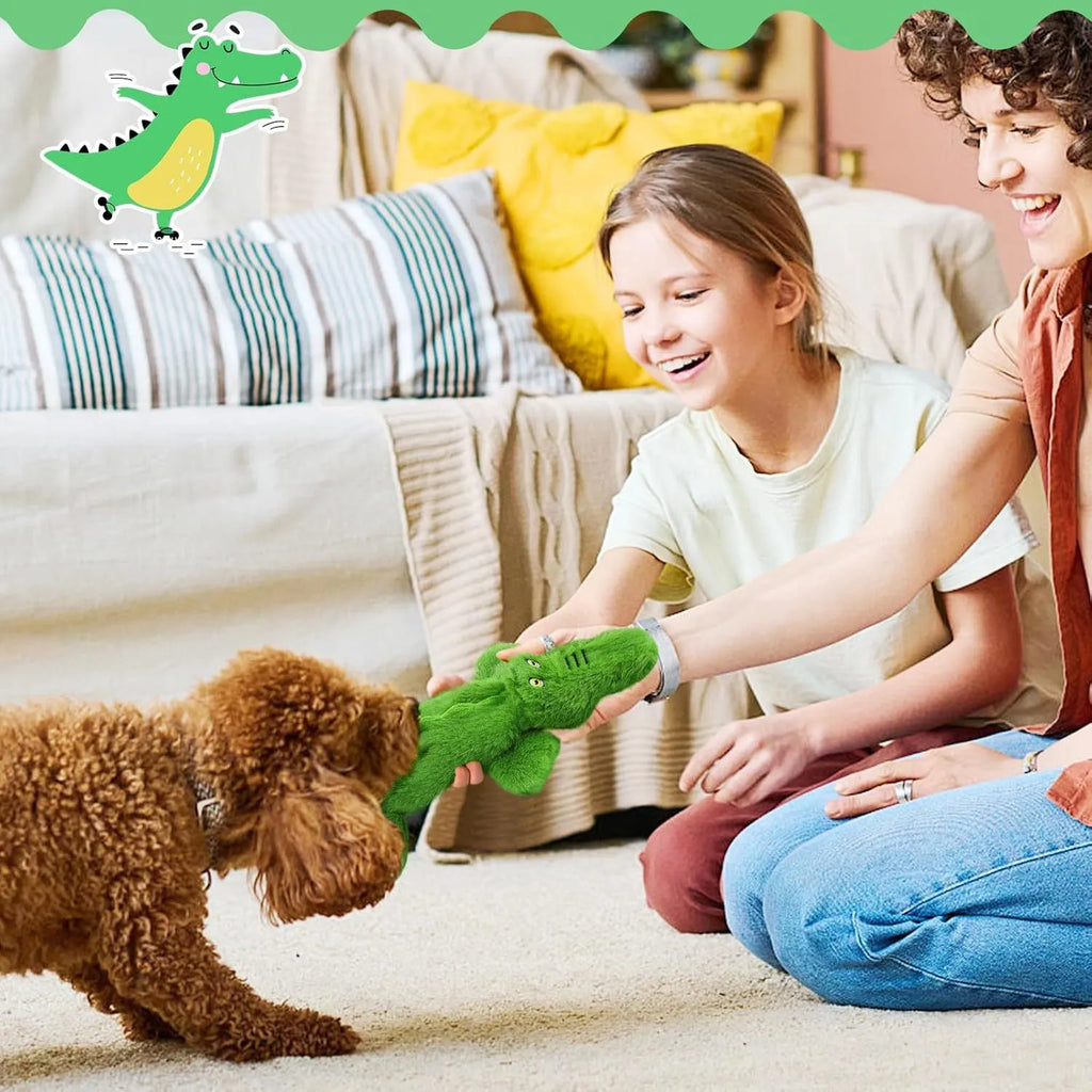 Green crocodile-shaped plush dog toy with a squeaker and crinkle tail for aggressive chewers.