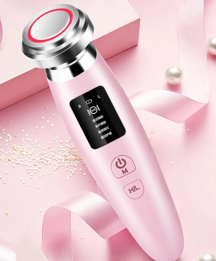 Pink cleansing and rejuvenation beauty instrument measuring 185mm long