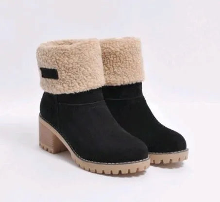 Women's black suede mid-tube snow boots with a thick heel and round toe on a waterproof platform.