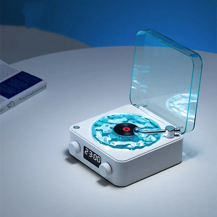 Retro turntable Bluetooth speaker with rotating transparent disc and RGB lighting effects