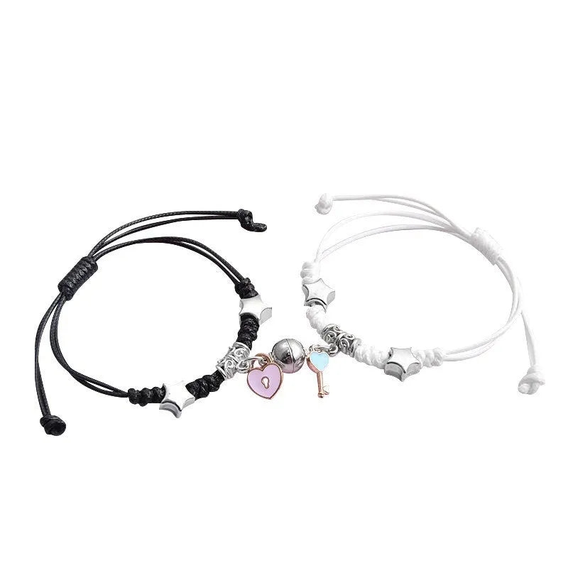Magnetic couple bracelet set with electroplated alloy construction and various charm designs