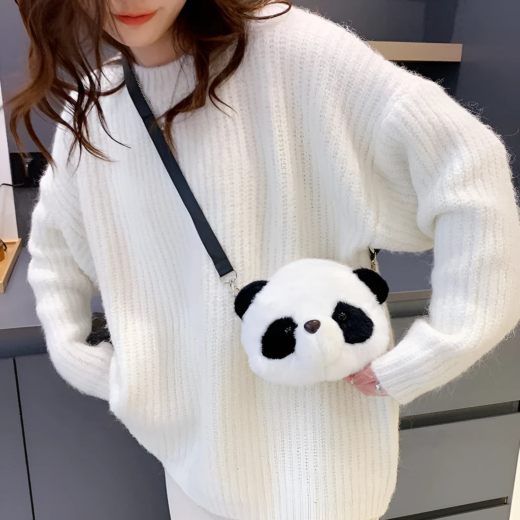 Soft plush crossbody bag with panda head design, cylindrical shape.