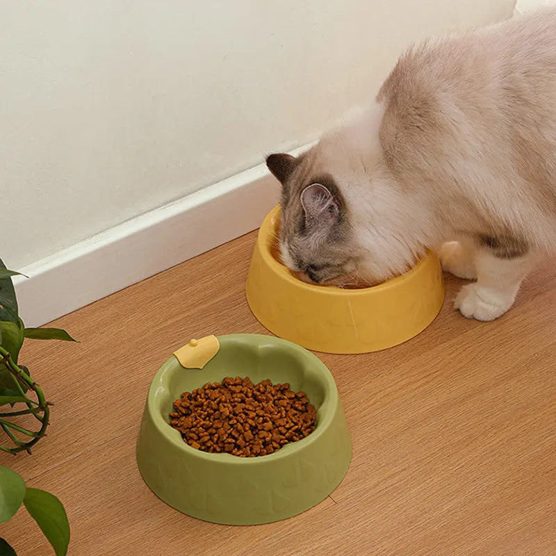 Green plastic flower-shaped double pet bowl for dog and cat food and water.