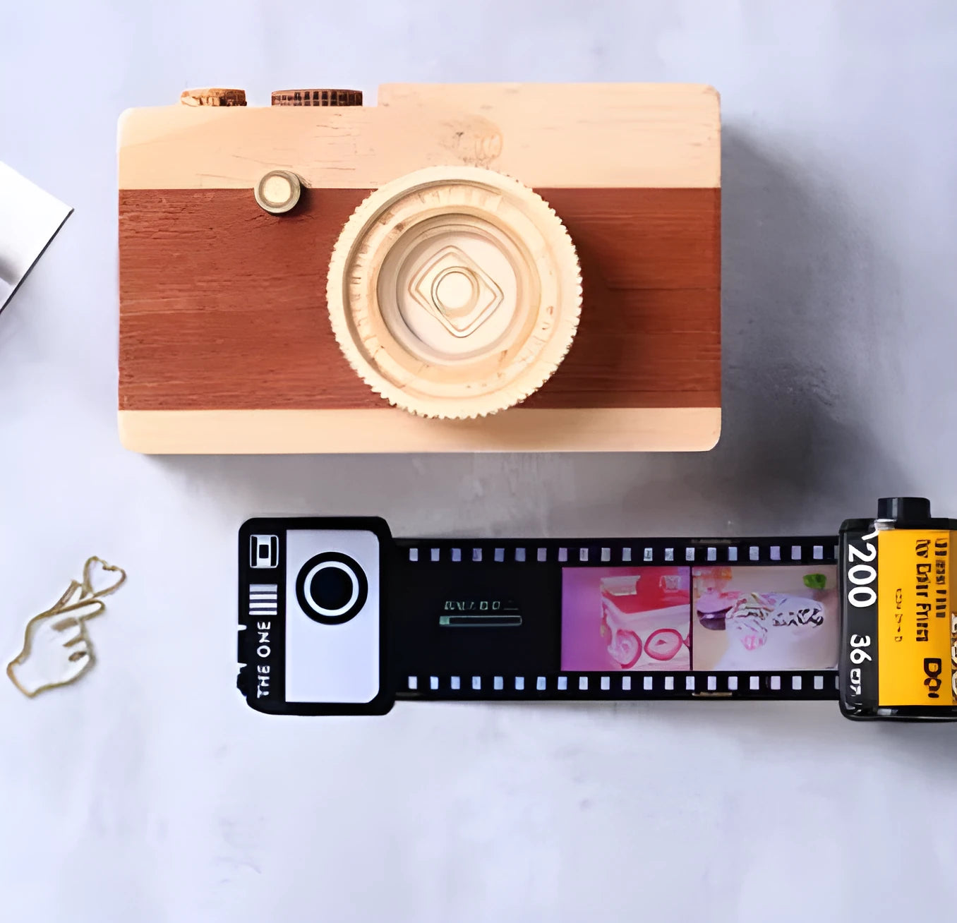 Kodak yellow wooden memory colour film album boxes stacked with a tote bag