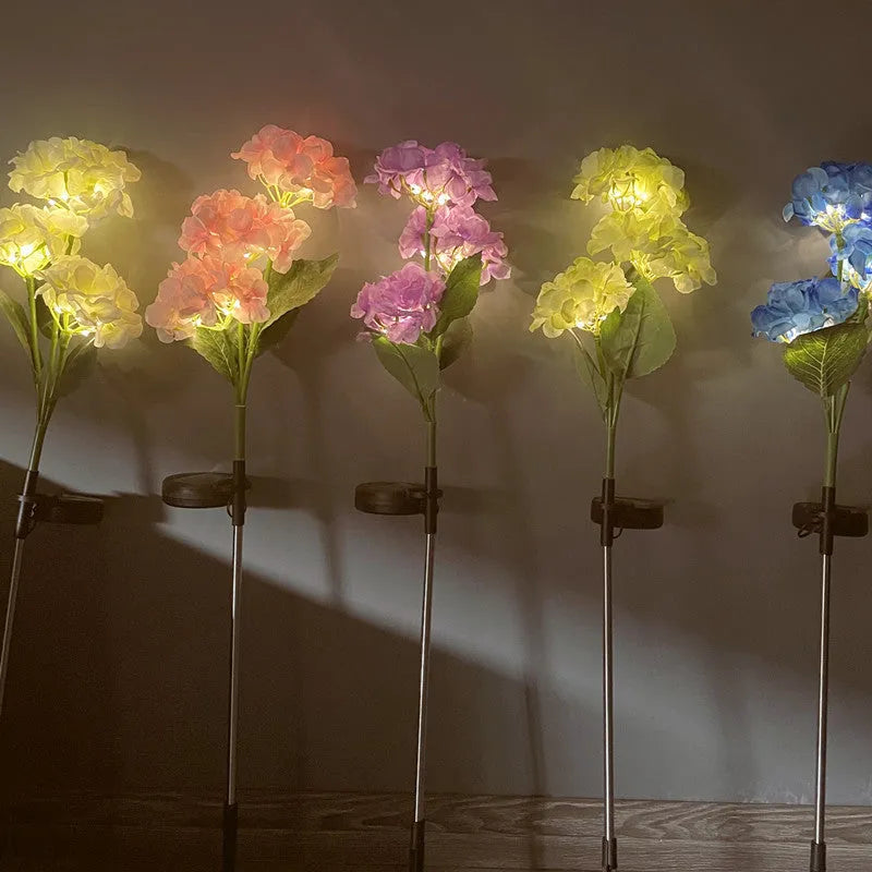 Solar hydrangea garden decorative light in garden setting with floor outlet placement