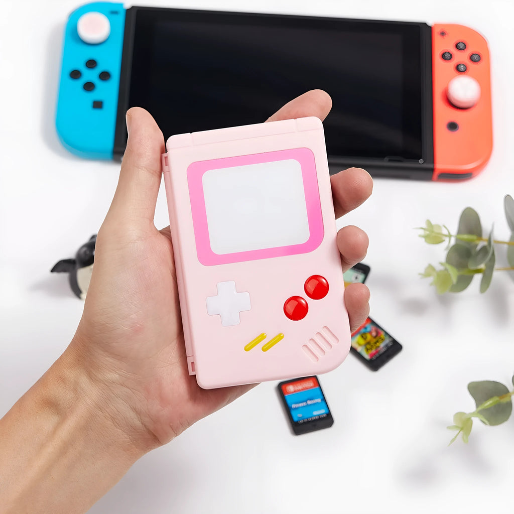 Small portable Nintendo Switch game card storage box in blue, pink or white.