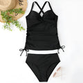 Women's black high-waisted nylon bikini set for swimming sports on a mannequin.