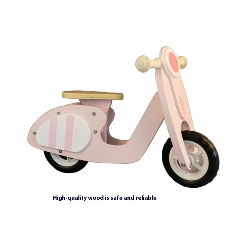 Pink wooden toddler balance scooter with a 10-inch deck for children aged 1-6.