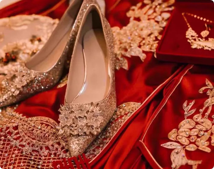 Champagne coloured women's wedding shoes with pointed toe, rhinestone details, and a fine heel.