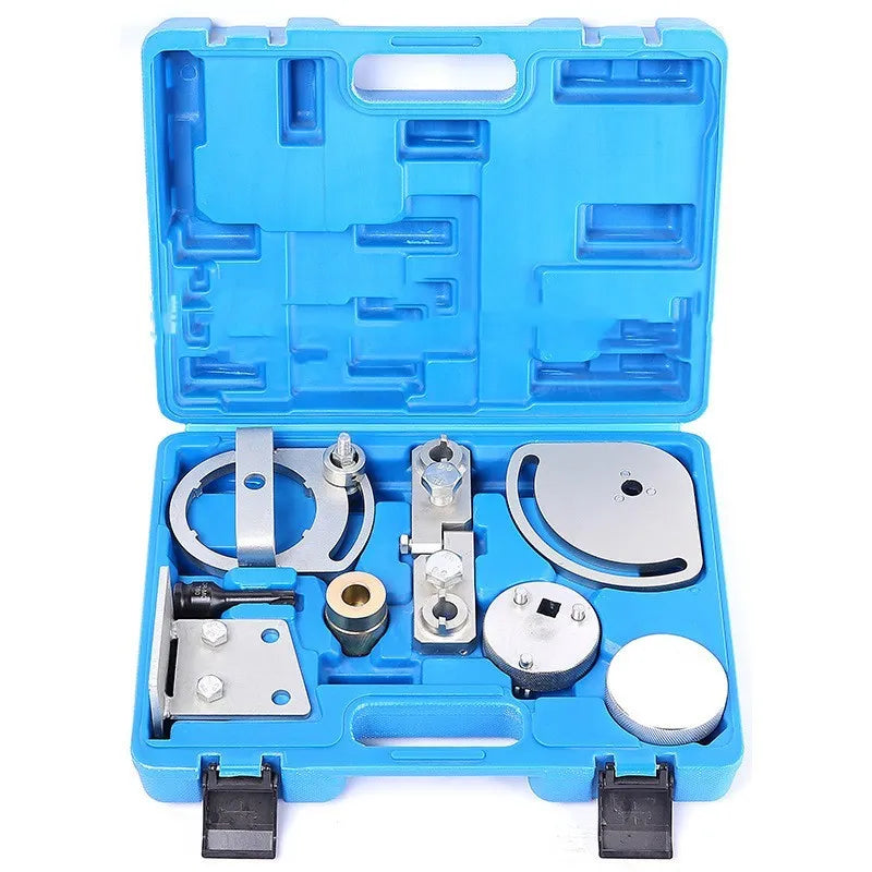 Eight carbon steel Volvo engine timing tools for cylinder head and camshaft alignment on a workshop bench.