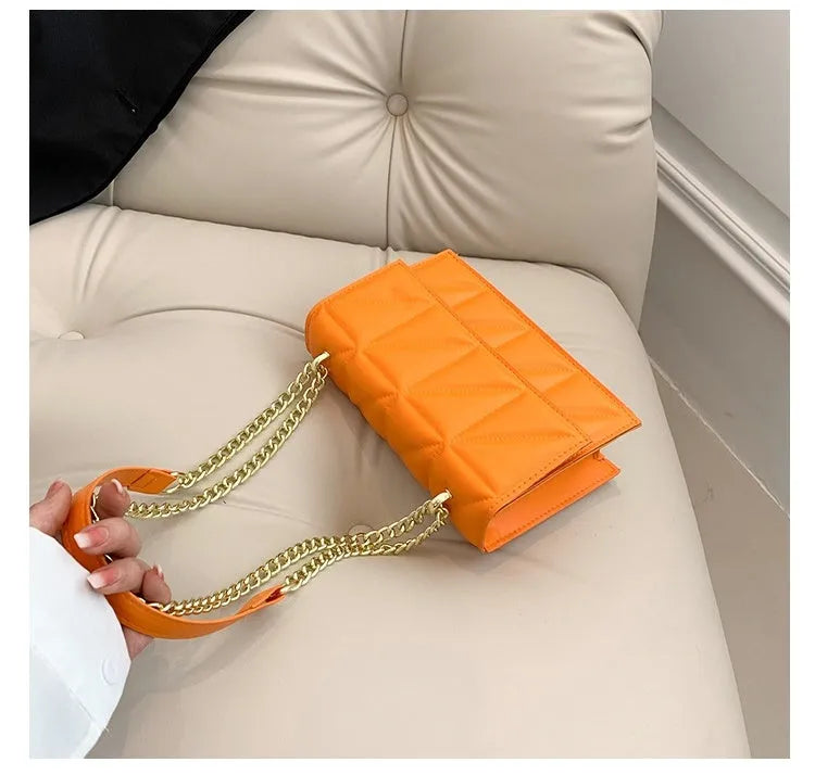 Small square crossbody shoulder bag in PU leather with chain and shoulder strap, available in five colours, 22cm width