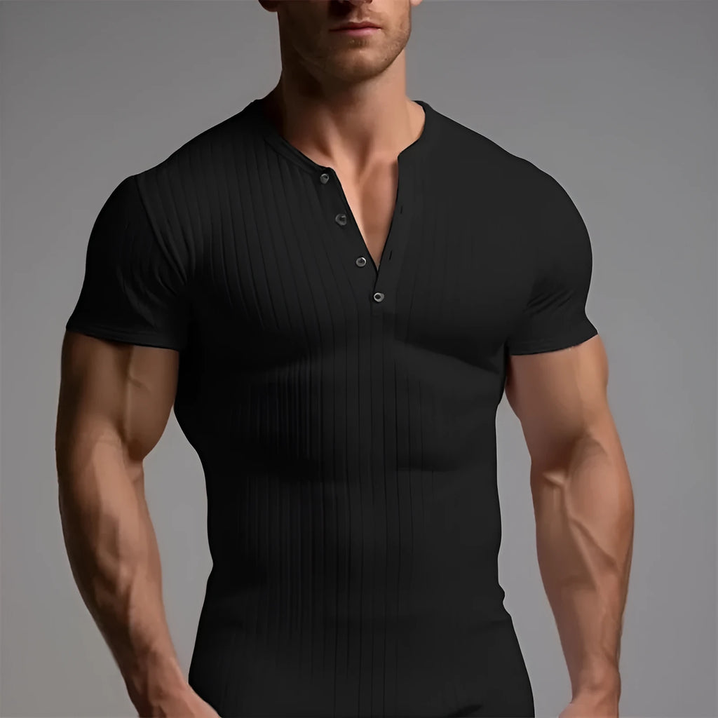 Men's slim-fit muscle short sleeve sports t-shirt in polyester fabric on a grey background.