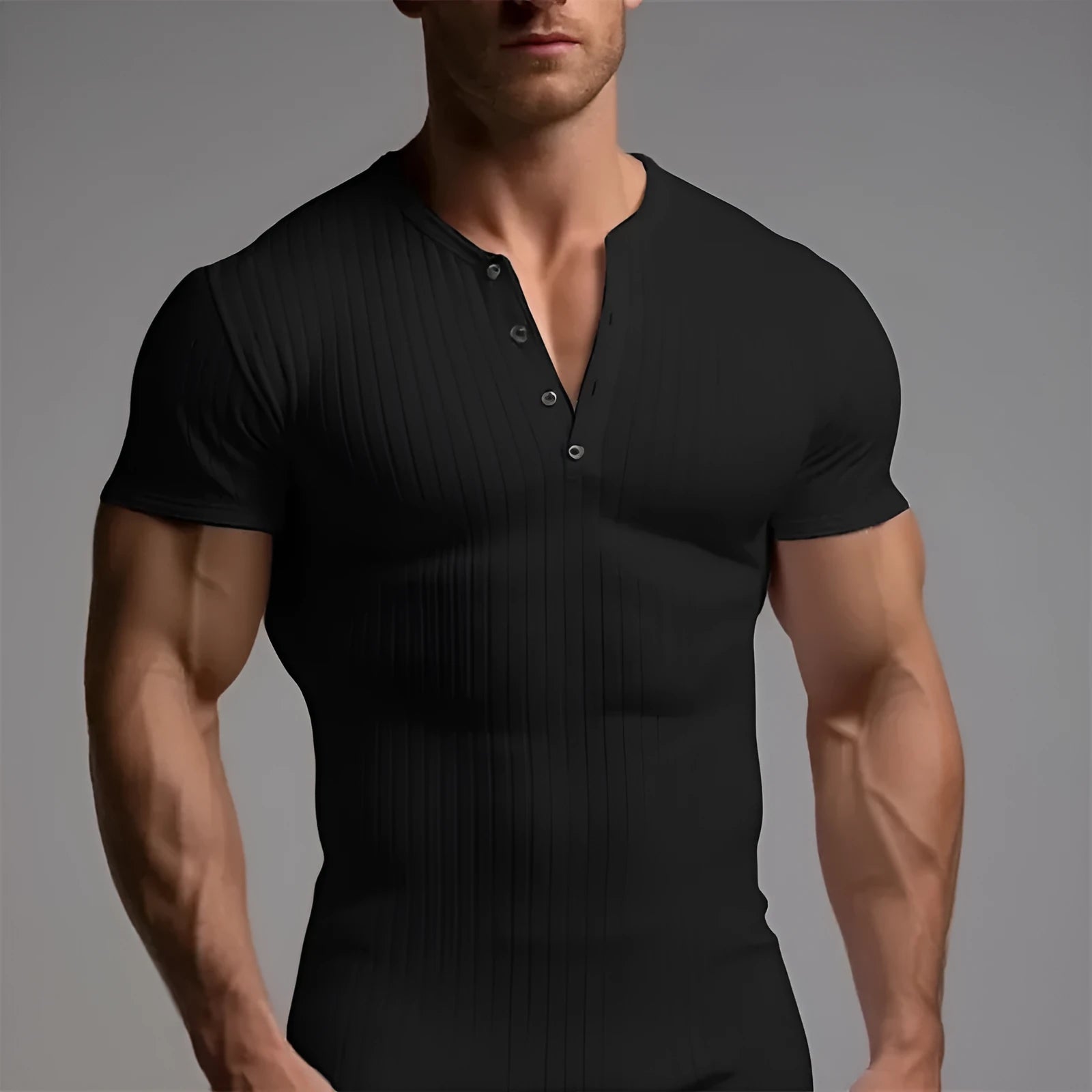 Men's slim-fit muscle short sleeve sports t-shirt in polyester fabric on a grey background.