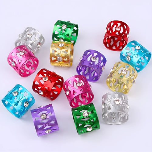 Aluminium hair ring wig decoration with hollow jewelled design and crown motif in multiple colour options.