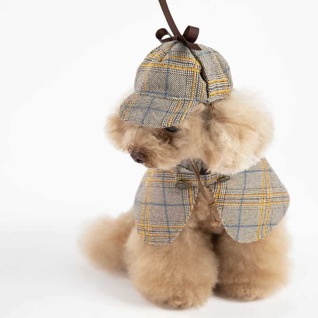 Camel coloured cotton pet cloak with an adjustable hat for a dog, showing the cloak design.