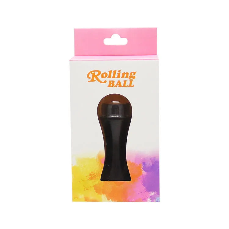 A small portable volcanic stone roller for absorbing facial oil, shown in various colours on a neutral background.
