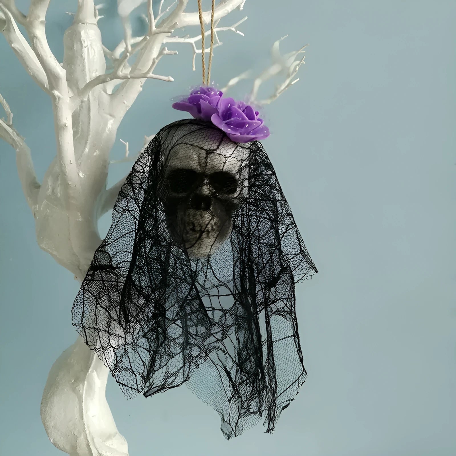 Foam Halloween skull hanging decor in purple colour on white background