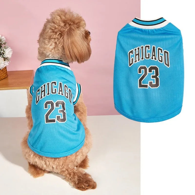 Mesh polyester dog basketball vest in black with basketball design, side view on a white background