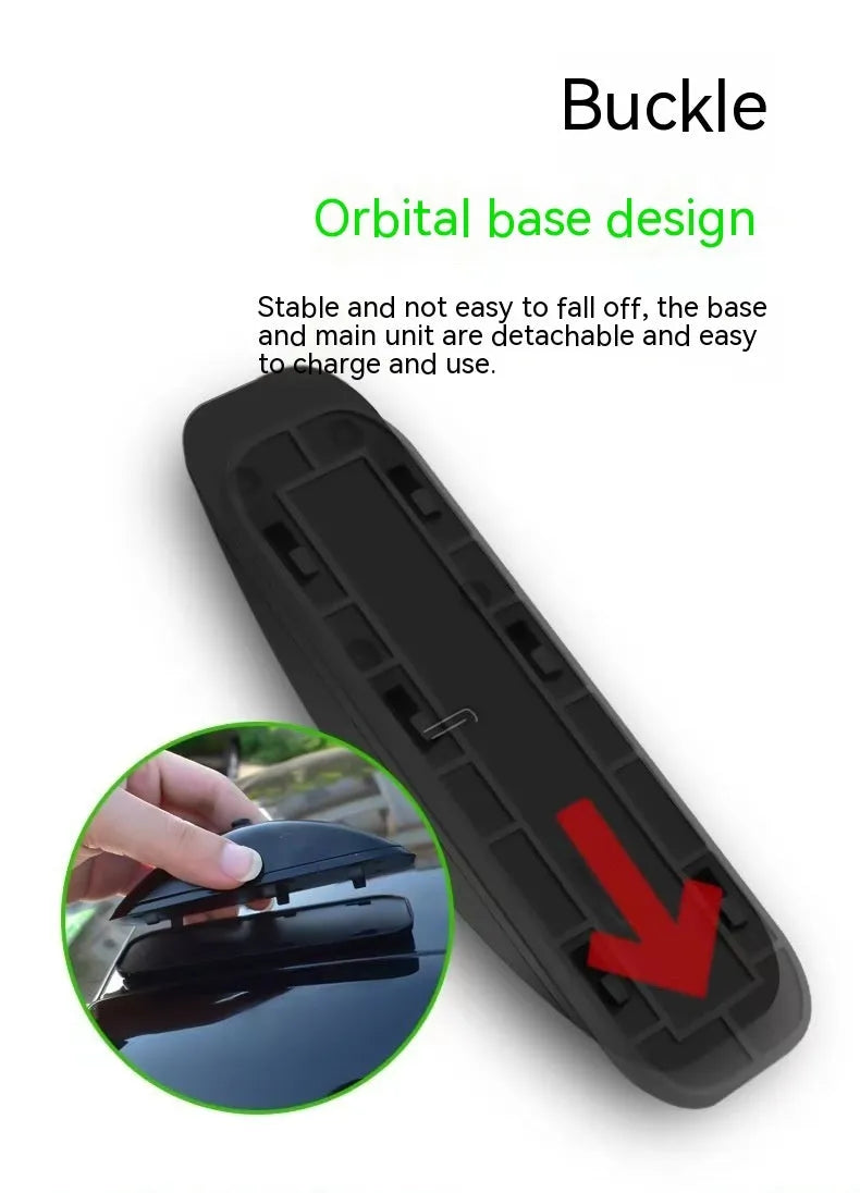 Black vehicle-mounted remote control laser lamp with USB cable and remote on car surface