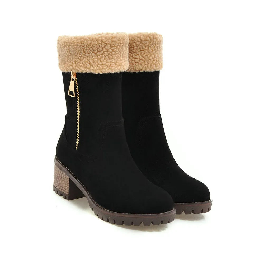 Unisex black snow boots with a rubber sole and plush lining on a white background.