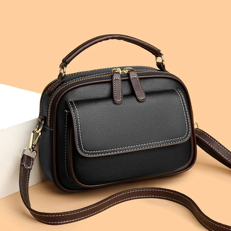 Women's cross-body portable shoulder bag in horizontal square shape with black, green or orange colour options