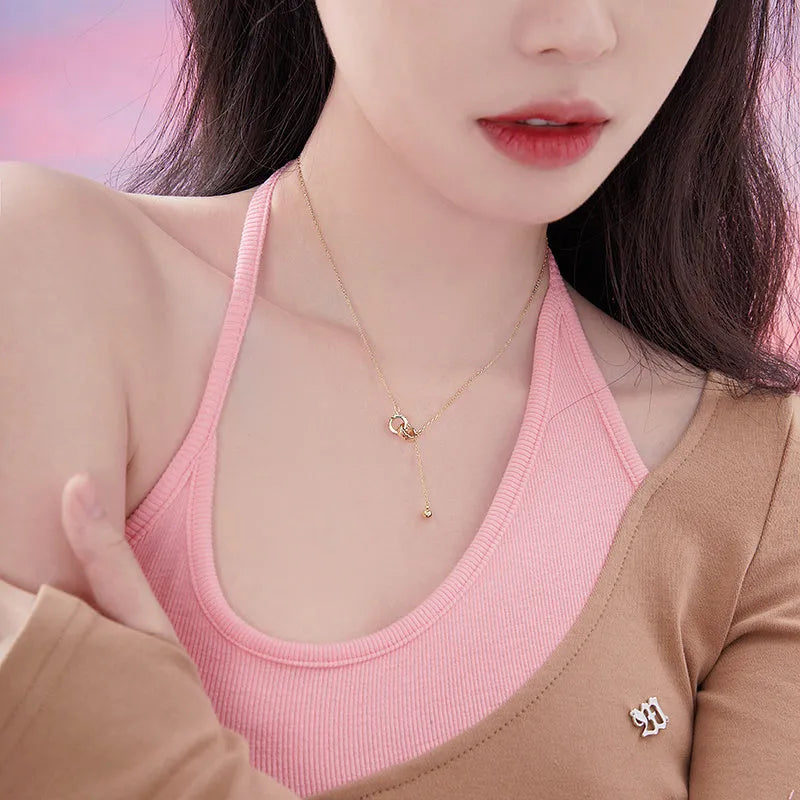 Gold necklace clavicle chain on display showing pendant-free design and gold plating finish