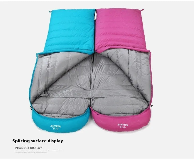 Black outdoor sleeping bag with envelope design, shown with a bladeless fan accessory.