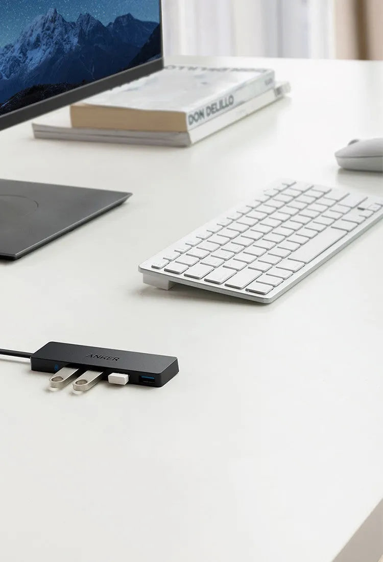 Black Anker 4-port USB 3.0 hub showing compact size and four Type-A ports.