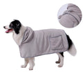 A blue dog bath robe towel with an adjustable waistband wrapped around a dog, showing the snap button closure.