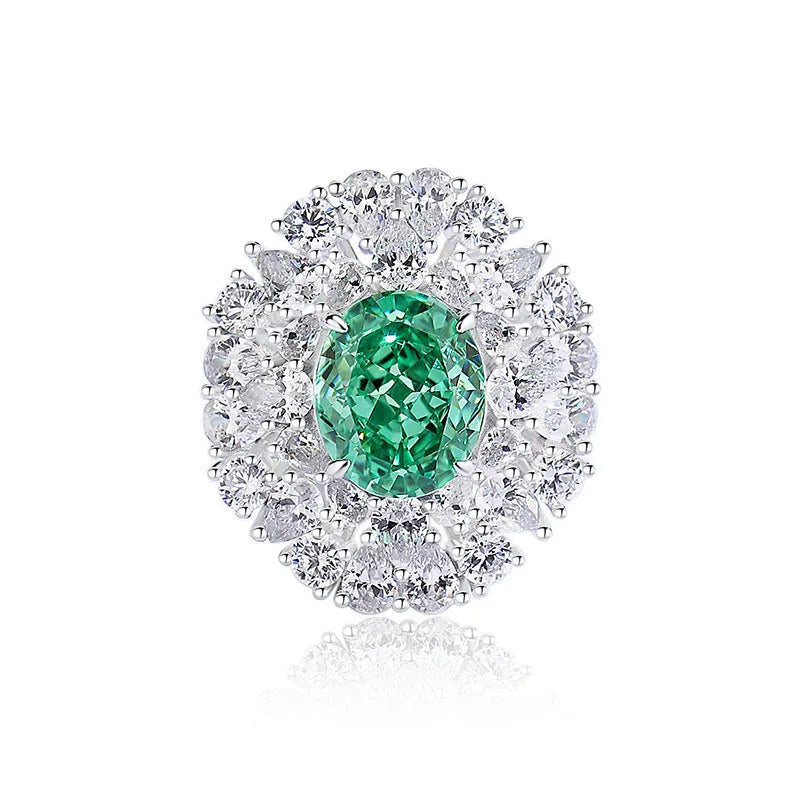 S925 sterling silver geometric ring with ellipse emerald stone and Palaibahao diamond accent on a model's finger.