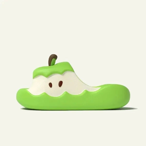 Cartoon fruit patterned EVA flip flop slippers for couples and families on a white background.