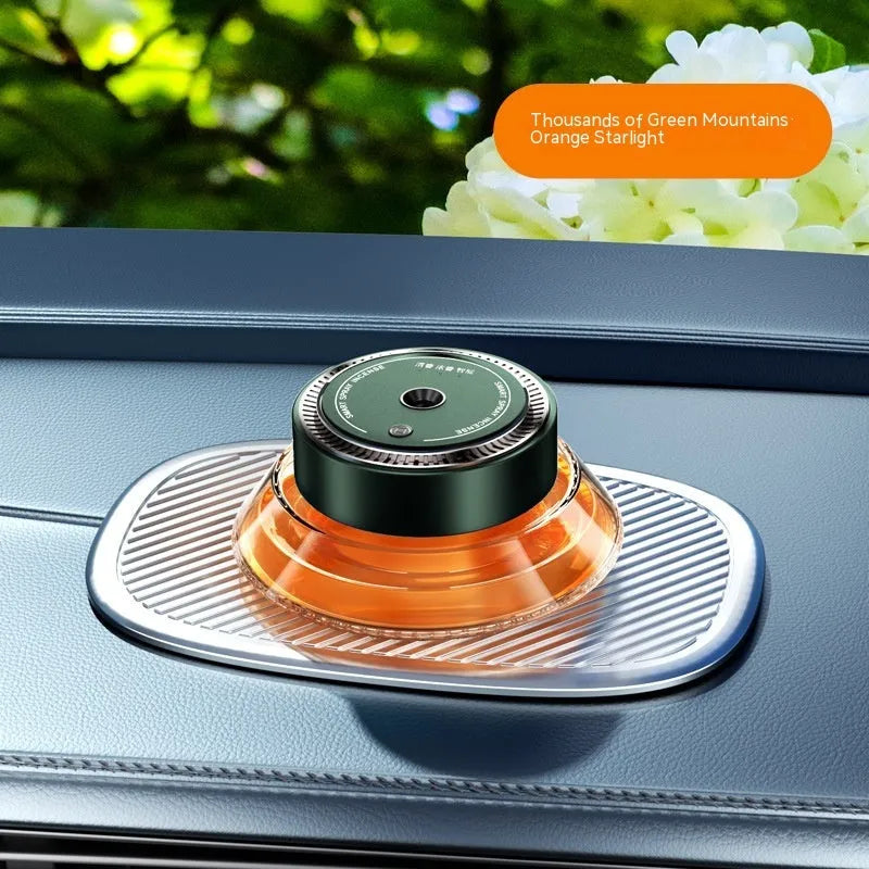 Smart Spray car-mounted air freshener unit in black and green colour options with refill bottle.