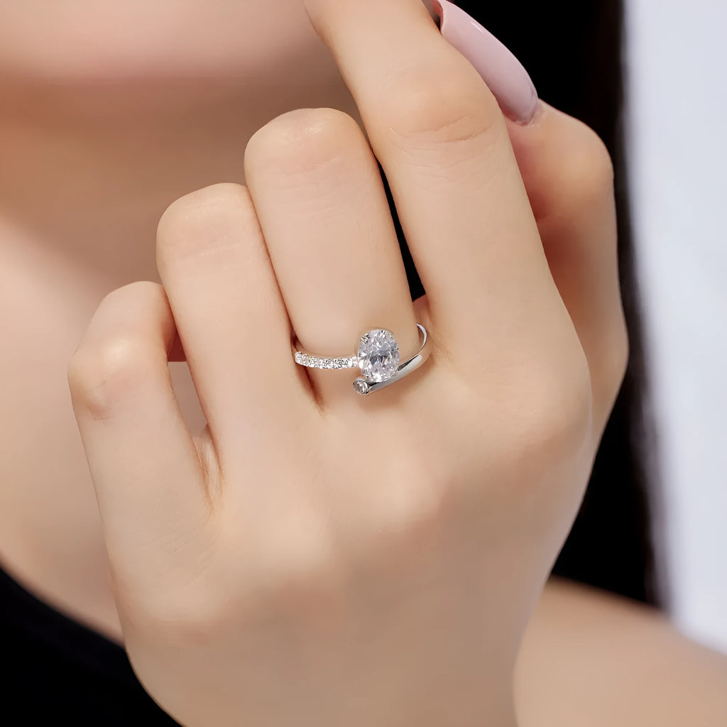 S925 sterling silver ring with oval zircon star track design on white background