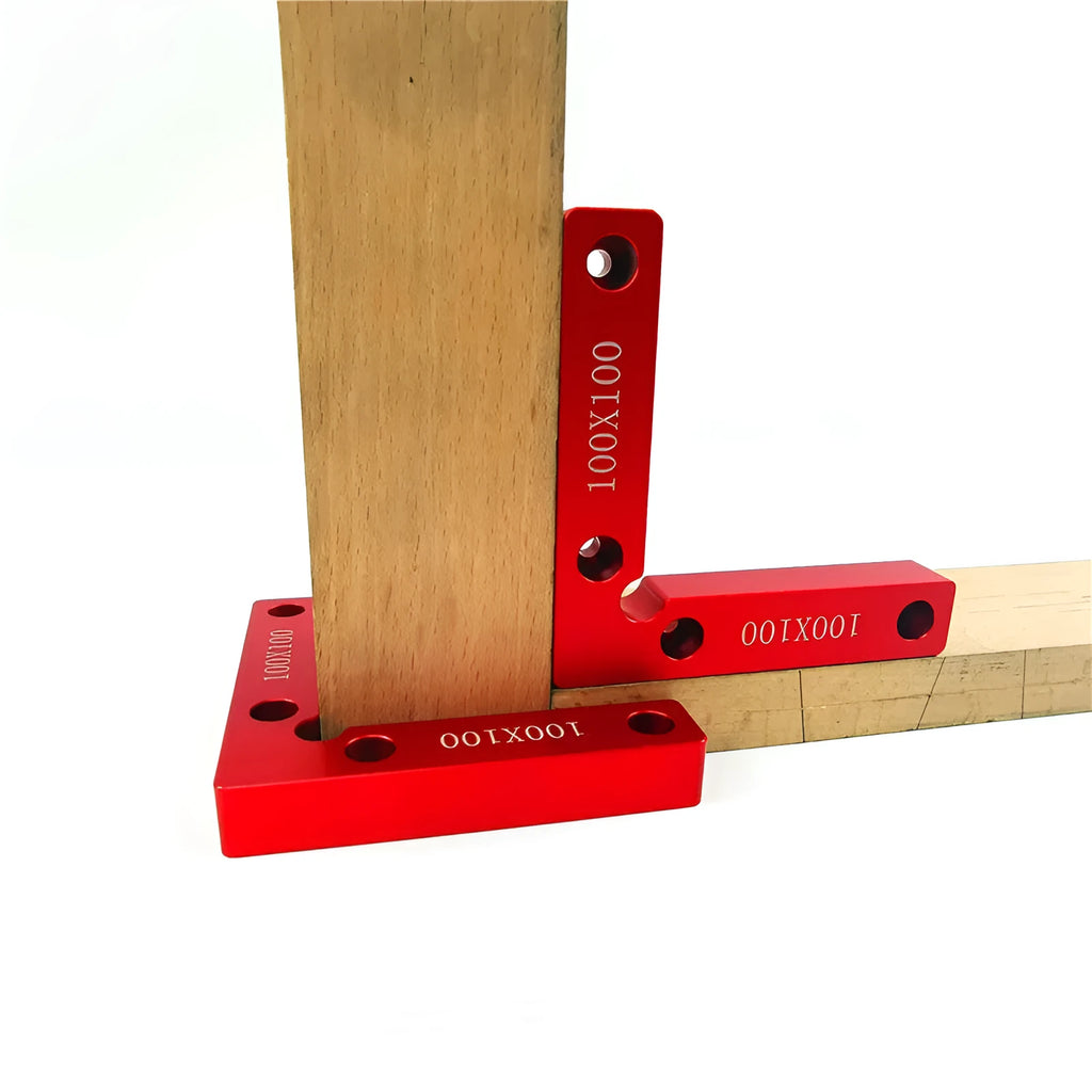 Aluminium woodworking right angle positioning block with engraved scale, shown next to a clamp.
