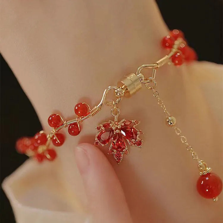 Red ginkgo leaf magnetic bracelet with electroplated alloy finish and adjustable sizing