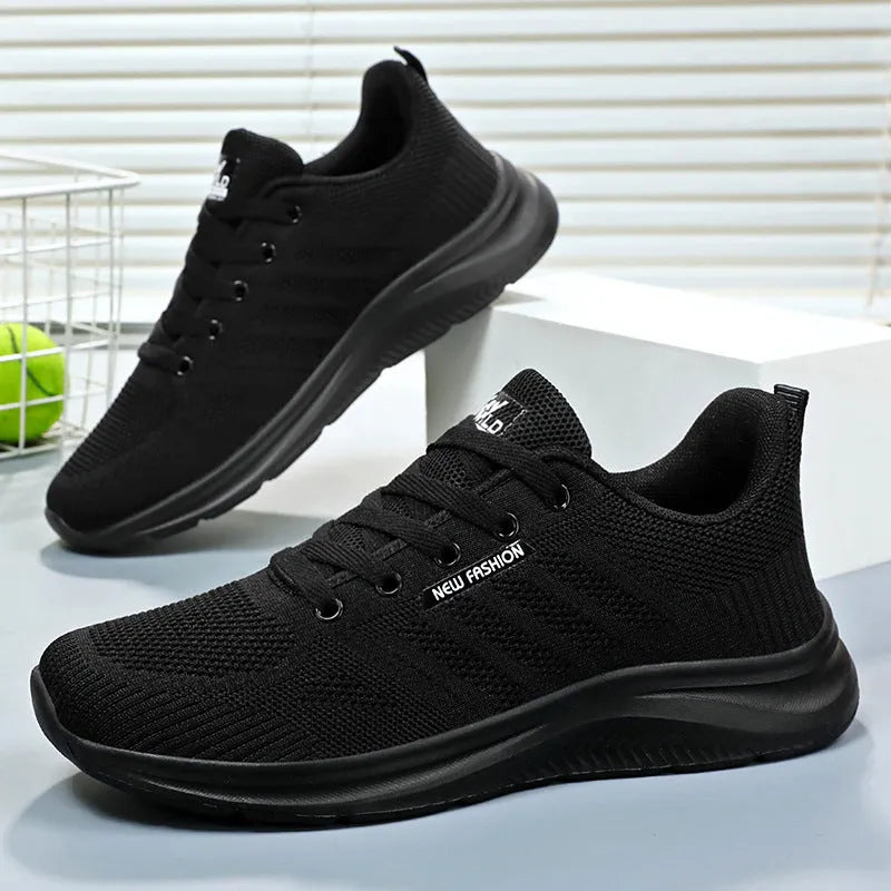 Unisex mesh upper casual trainers in solid colour, available in black, grey, and pink, sizes 36-44