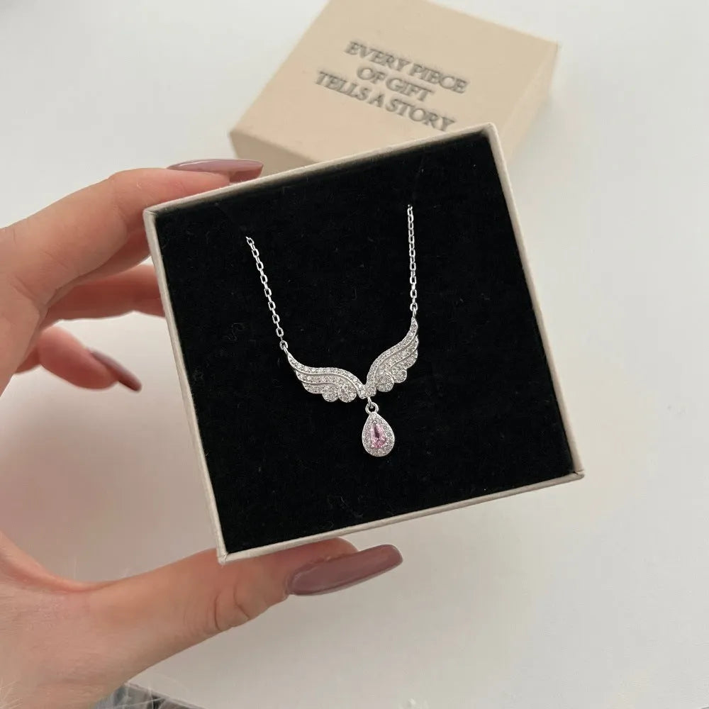 925 silver platinum electroplated pendant necklace with wing water drop shape and clear zircon stone