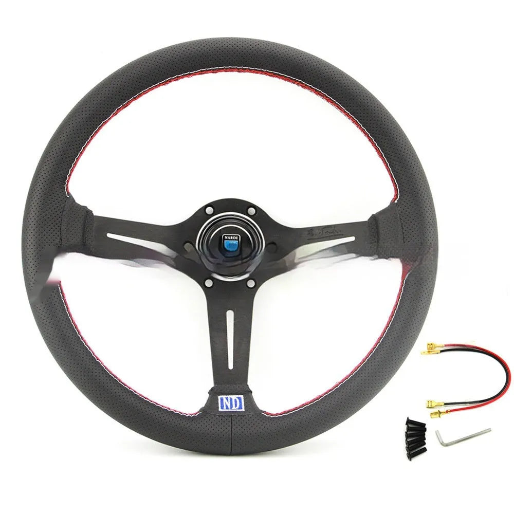 Leather-wrapped 14-inch steering wheel with concave centre and silver metal skeleton frame