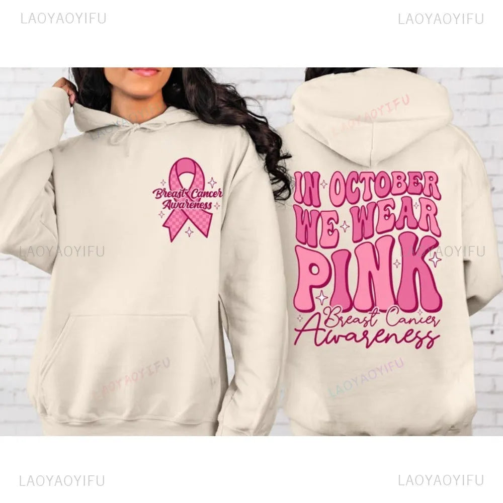 Pink breast cancer awareness pullover hoodie with retro hot stamp design and side pockets.
