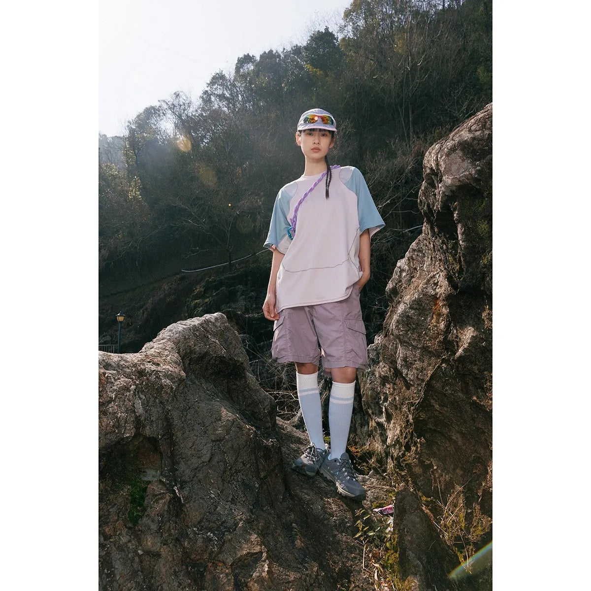 Men's loose fit patchwork t-shirt in blue or beige with short raglan sleeves.