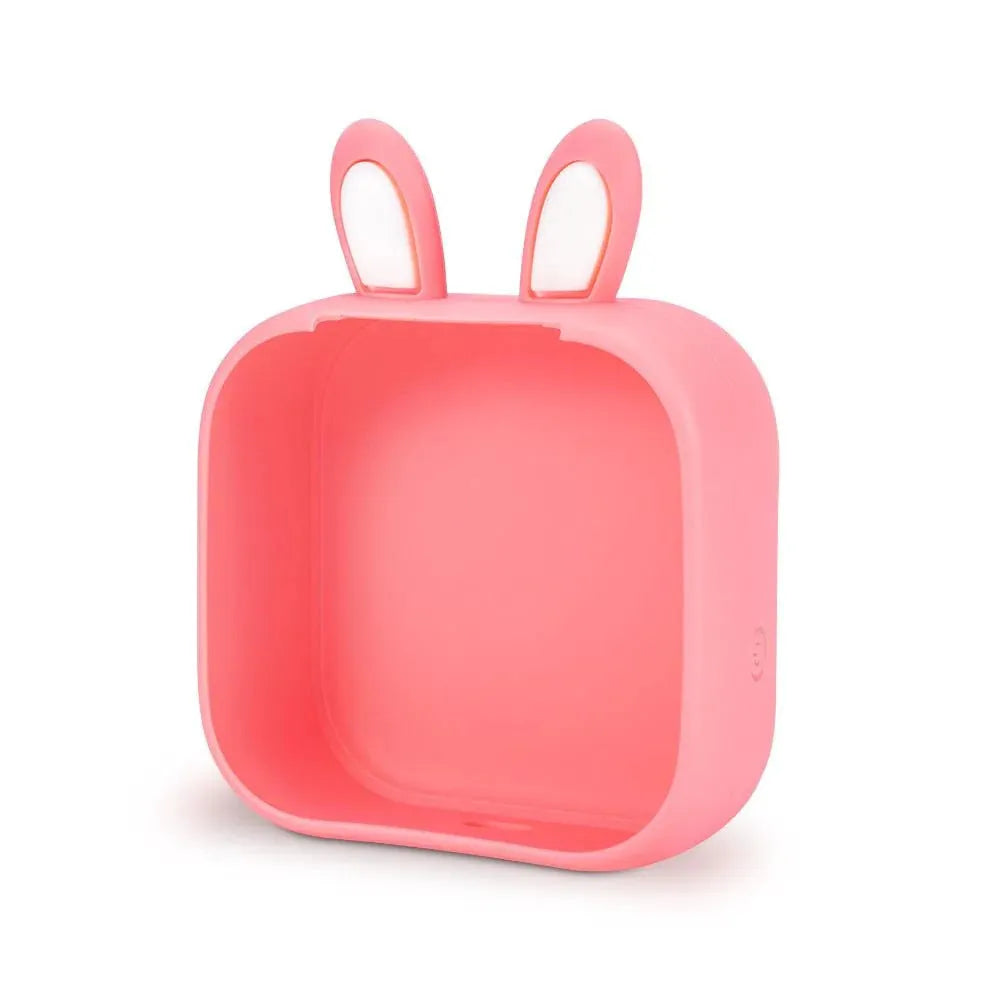 Mini pink Bluetooth thermal printer with rabbit ear protective case and USB cable on a table.