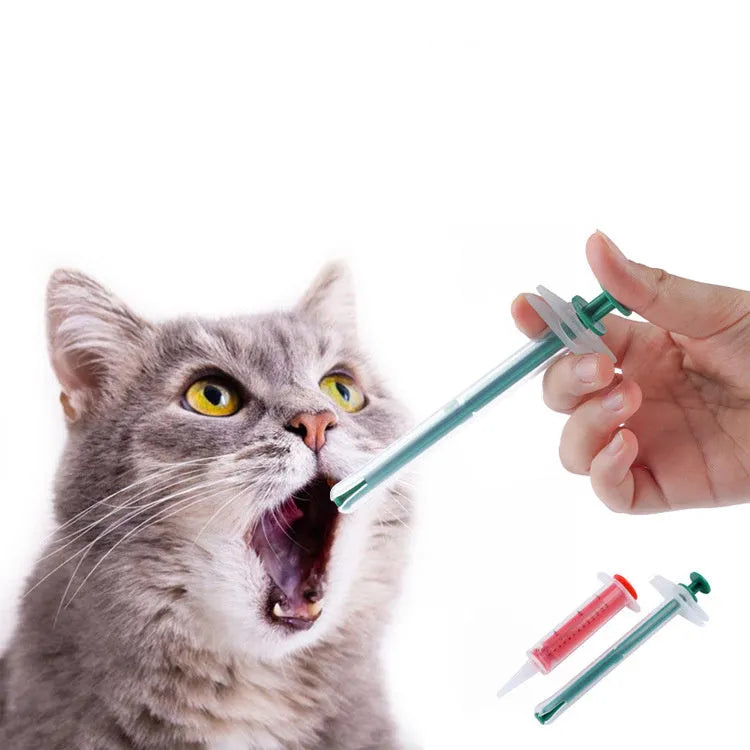 Two pet pill shooters with soft silicone tips for administering tablets to cats and dogs