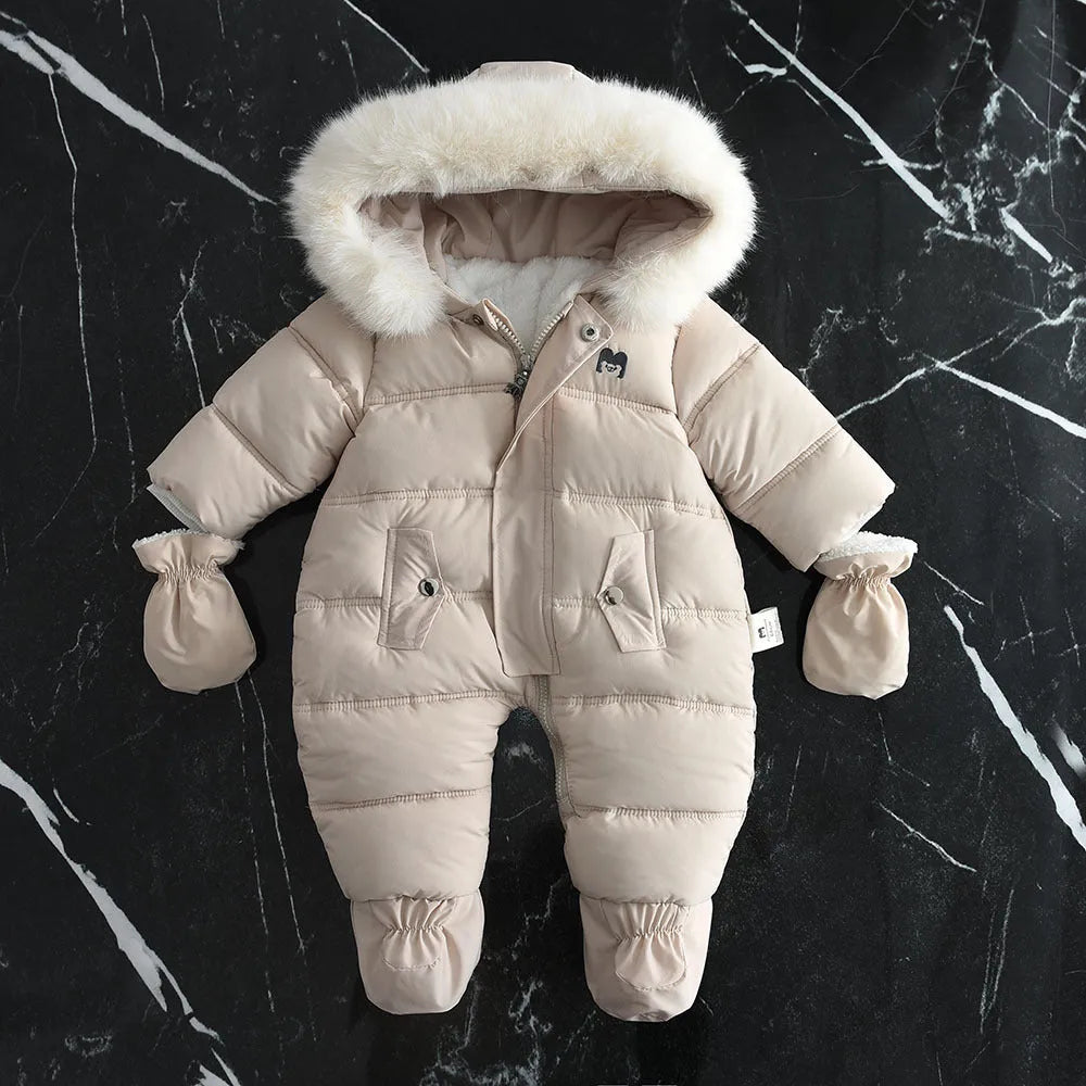 Fleece-lined thick hooded baby jumpsuit in beige with zip front and fur hood
