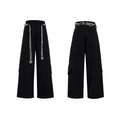 Men's dark blue loose straight-leg trousers with heavy 3D stitching and zipper decorations.