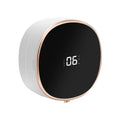 White automatic soap dispenser with infrared sensor and USB charging port on countertop